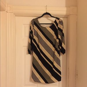 Black and cream dress with back zipper